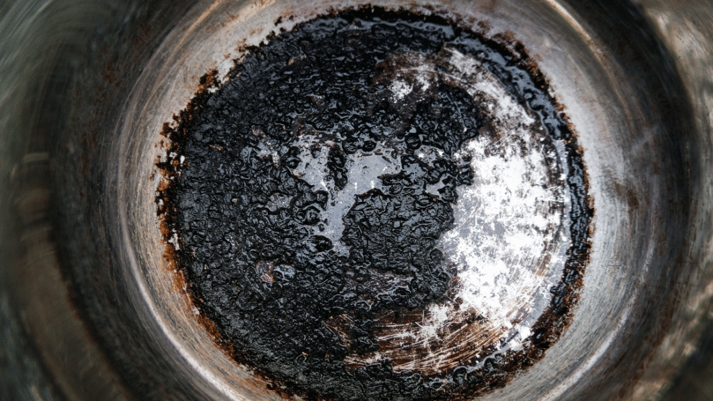 how to clean bottom of stainless steel pans